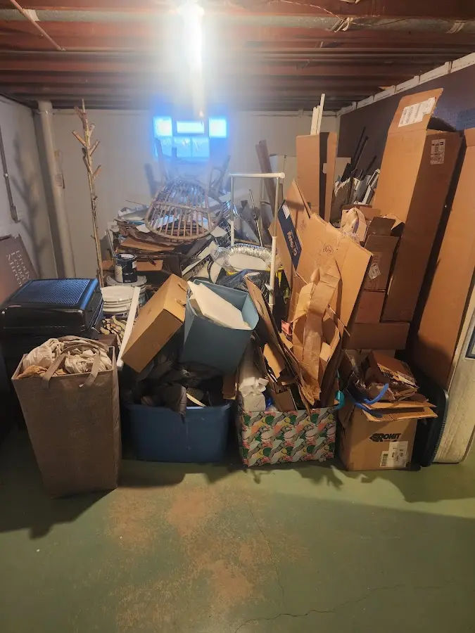 Roll-off dumpster container at job site for Roll Off Dumpster Rental in Malverne